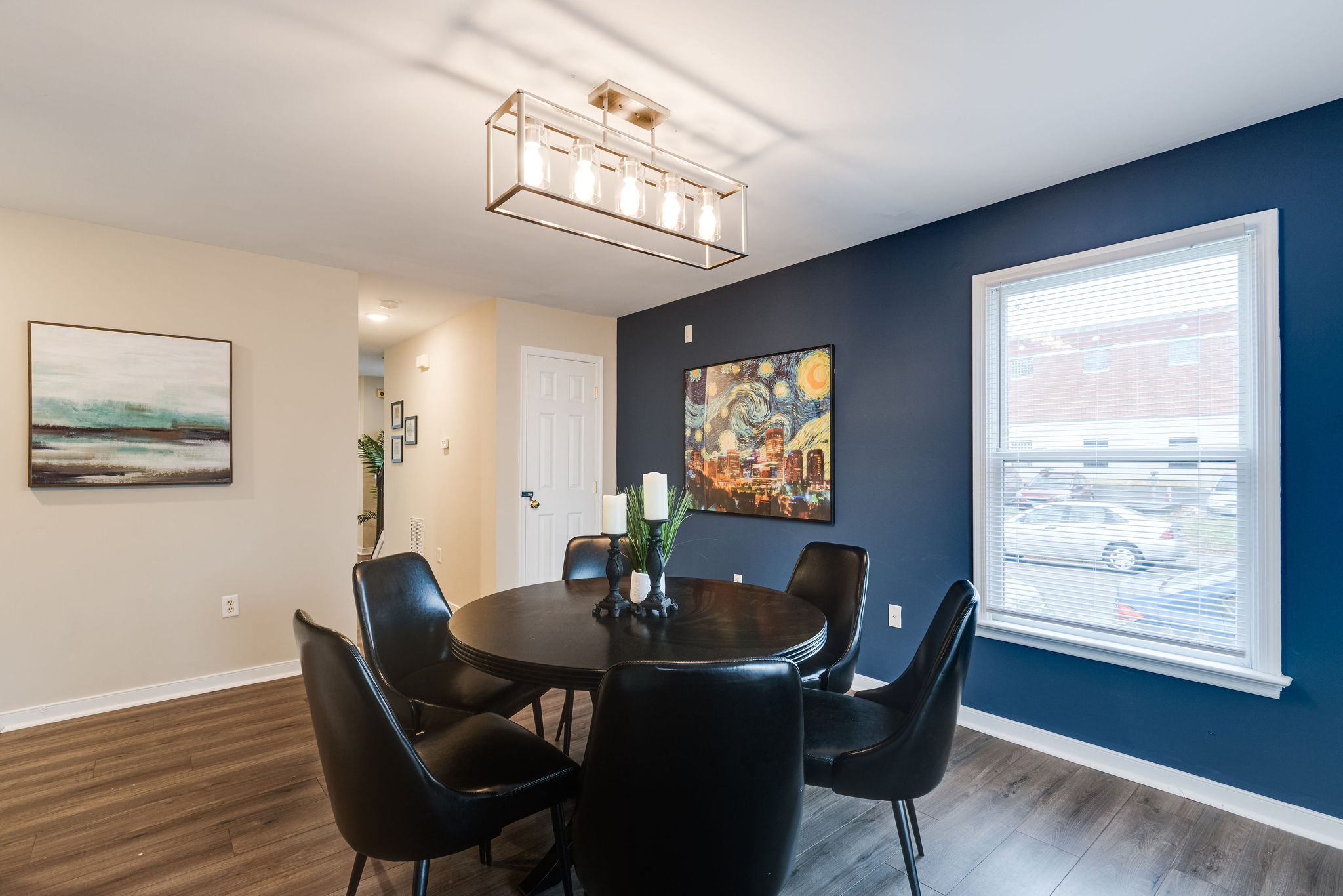 dining room with a blue wall