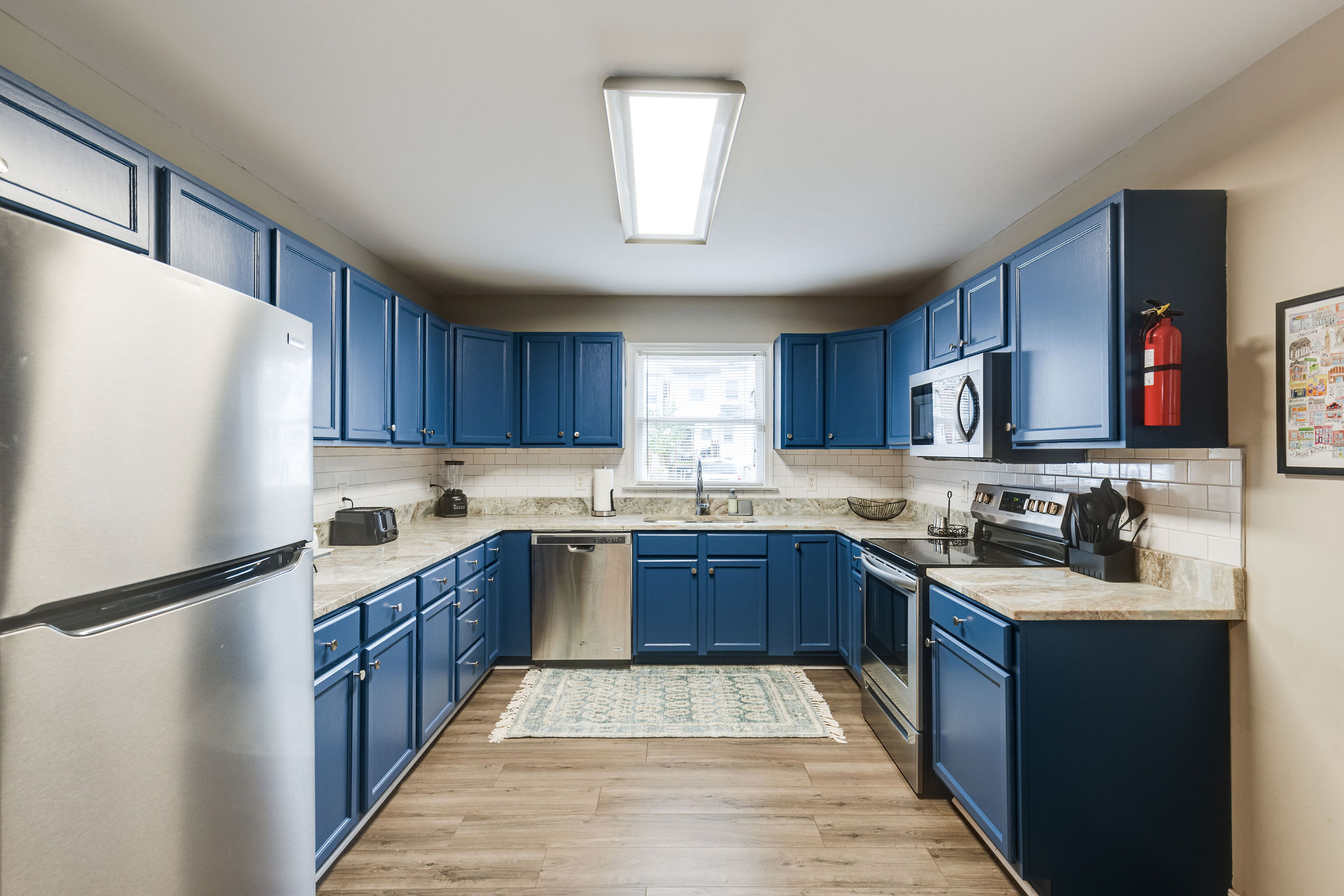 kitchen with blue cabinets