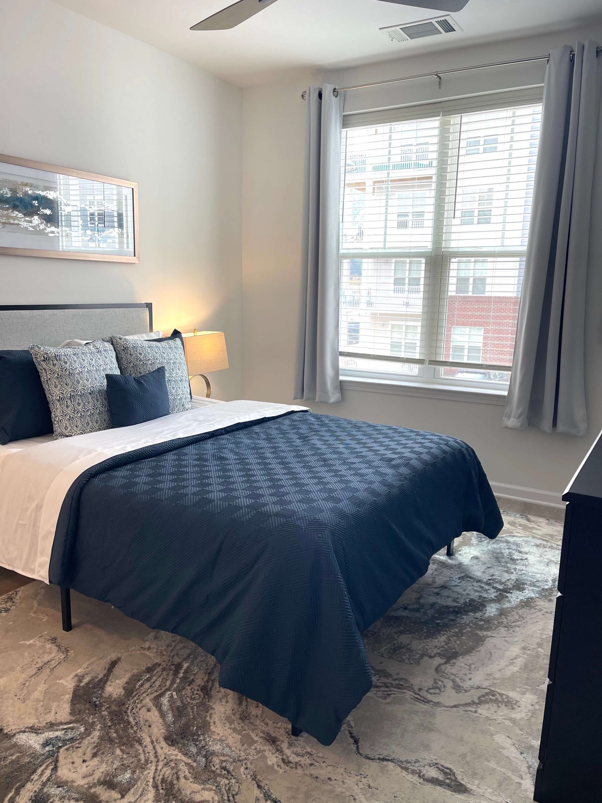 bed with blue blanket