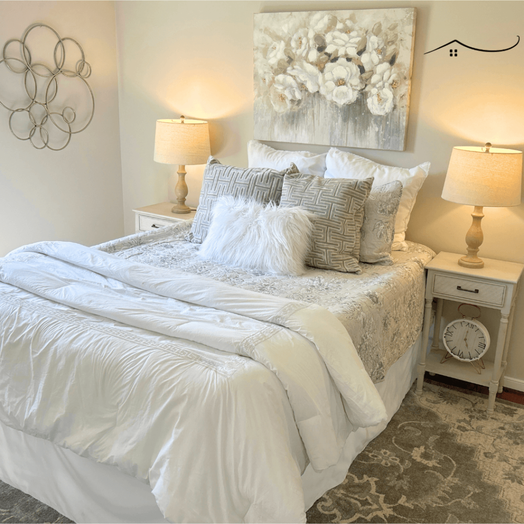 bed with tan and white covers