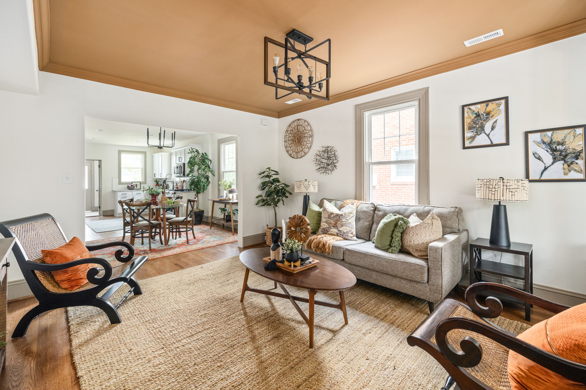 living room with two chairs and a sofa